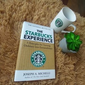 Starbucks coffee mug circa 2008 and book